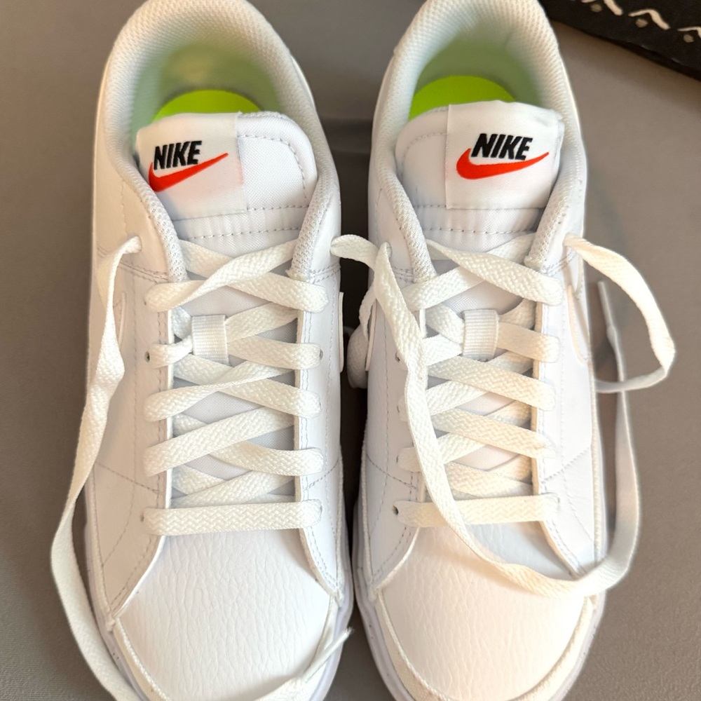 Nike White Sneakers with Red Swoosh